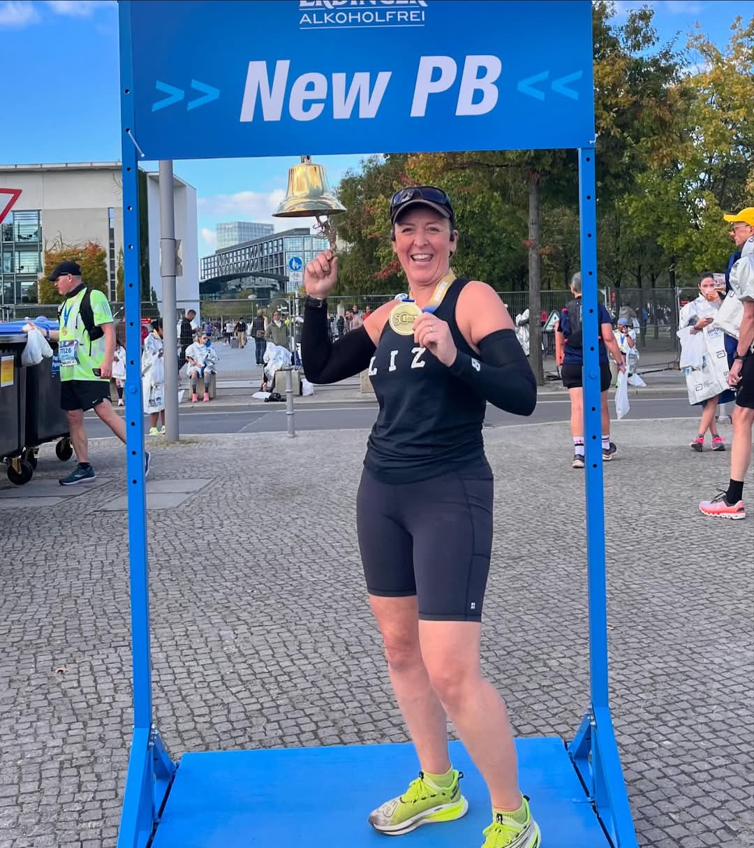 Liz ringing the bell in Berlin